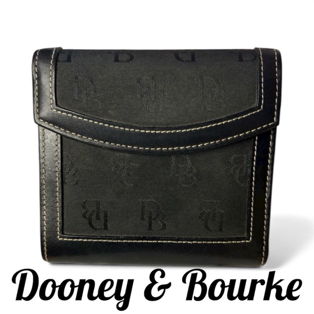 Dooney & Bourke signature canvas & leather trim. EUC. 4.5”x 5” approximately